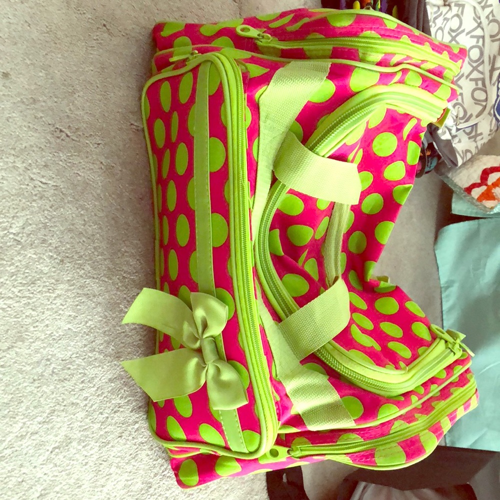 Bright polkadot luggage bag